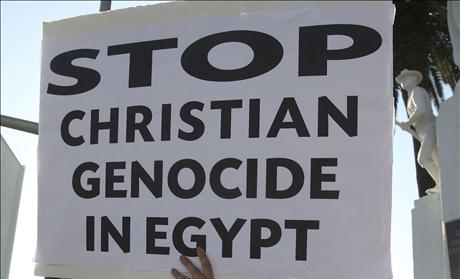 Coptic Christians protest against the killings of people during clashes in Cairo between Christian protesters and military police, in Los Angeles