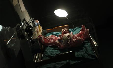 A baby is seen minutes after he was born at the pediatric unit at hospital Escuela in Tegucigalpa