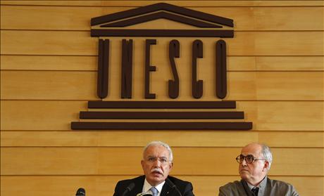Palestinian Foreign Minister al-Malki and Palestinian ambassador to UNESCO Sanbar attend a press conference during the 36th session of UNESCO's General Conference in Paris - United Nations