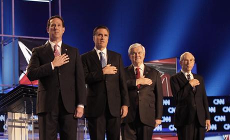 Republican presidential candidates stand on stage before participating in a Republican presidential candidates debate in Charleston 