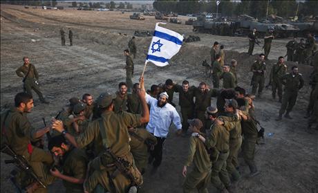 Jewish man holds Israeli flag