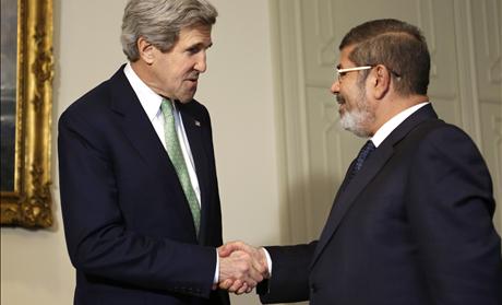 John Kerry with Mohamed Mursi