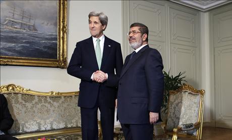 John Kerry with Mohamed Mursi