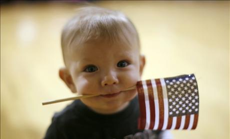 Baby Boy Carries US Flag