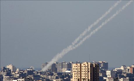 Trails of smoke are seen after launch of rockets from Gaza
