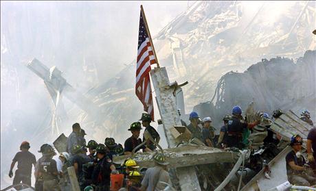 A U.S. flag is posted in the rubble of the World Trade Center September 13, 2001, in New York.