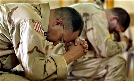 United States Army Chaplain Tim Meader (L) and Chaplain William Lovell, both from Fort Carson, Colorado