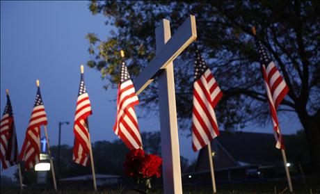 A memorial for the victims of the shootings at Fort Hood Army base stands outside of Central Christian Church in Killeen