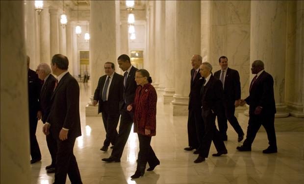 U.S. President-elect Obama walks with Supreme Court justices during a visit to the U.S. Supreme Court in Washington