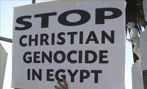 Coptic Christians protest against the killings of people during clashes in Cairo between Christian protesters and military police, in Los Angeles