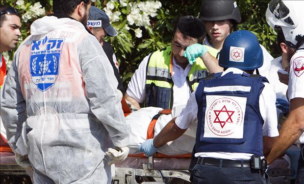 Israeli medics after rocket attack