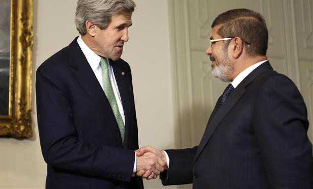 John Kerry with Mohamed Mursi