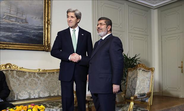John Kerry with Mohamed Mursi