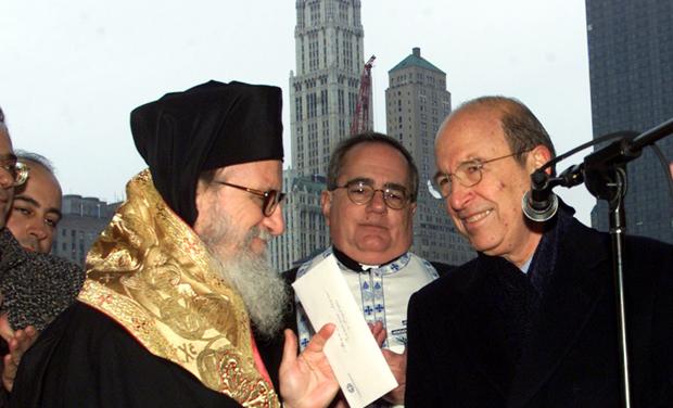 GREEK PRIME MINISTER DELIVERS CHECK TO ARCHBISHOP DIMITRIOS AT GROUND ZERO.