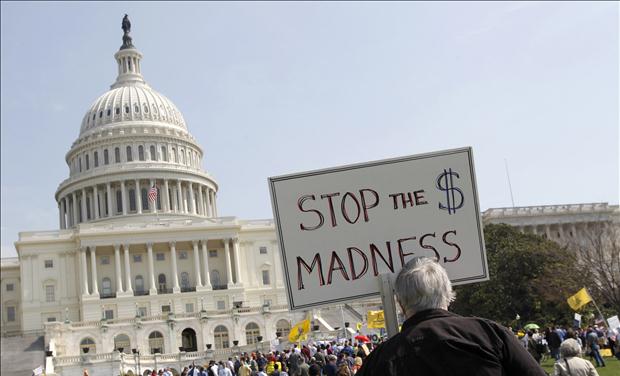 Opponents of the proposed U.S. health care bill are pictured during a rally outside the U.S. Capitol Building in Washington