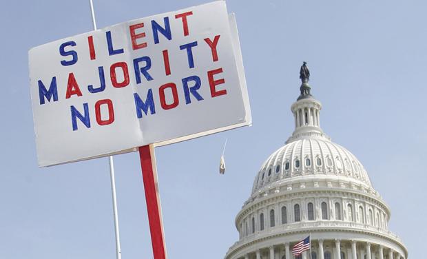 Opponents of the proposed U.S. health care bill are pictured during a rally outside the U.S. Capitol Building in Washington