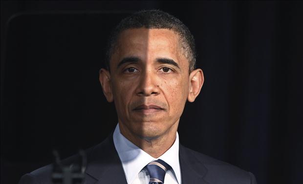 President Barack Obama pauses as seen through a teleprompter as he delivers a speech on U.S. fiscal and budgetary deficit policy at the George Washington University