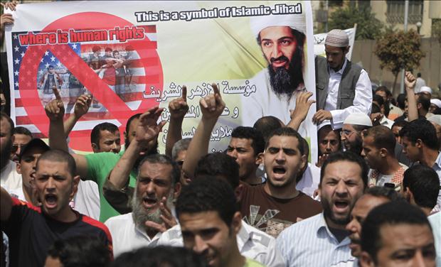 Islamists hold a picture of Osama bin Laden during a protest in Cairo