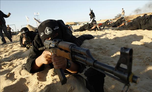 A Palestinian militant from Al-Ansar brigade takes part in a training session in Khan Younis in the southern Gaza Strip