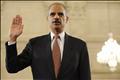 Holder is sworn in at the beginning of his confirmation hearing before the Senate Judiciary Committee on Capitol Hill in Washington
