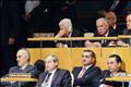 Palestinian President Mahmoud Abbas listens to U.S. President Barack Obama's address at the 66th United Nations General Assembly in New York