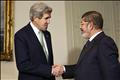 John Kerry with Mohamed Mursi