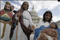 A nativity scene is displayed outside the U.S. Capitol building before a news conference to encourage people to apply for permits to display nativity scenes at public buildings across the nation during the Christmas season in Washington