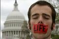 A pro-life supporter demonstrates in front of the Supreme Court in Washington