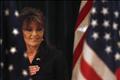 Former Alaska governor Sarah Palin looks down during the Pledge of Allegiance before speaking to the LIA Annual Meeting & Luncheon at the Crest Hollow Country Club in Woodbury