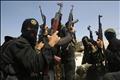 Palestinian militants from the Islamic Jihad group attend the funeral of their comrade Mohammed Moamar in Rafah, in the southern Gaza Strip