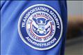 A Transportation Security Administration patch is seen on the shirt of a TSA security worker outside of terminal 4 at LAX, Los Angeles International Airport, in Los Angeles