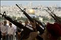 Israeli soldiers fire their weapons during a ceremony marking Memorial Day at the military cemetery on the Mount of Olives in Jerusalem