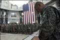 U.S. soldiers pray during a ceremony marking the 7th anniversary of the September 11 attacks in the United States, at the Al Faw palace in a U.S. military camp in Baghdad