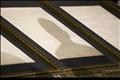 Shadow of U.S. President Obama is seen on Constitution of U.S. at National Archives in Washington