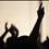 Members of the Redeemed Christian Church of God are silhouetted as they pray at Redemption Camp in Floyd