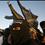 Palestinian militants of the popular resistant movement take part in a training drill in in Jabalya