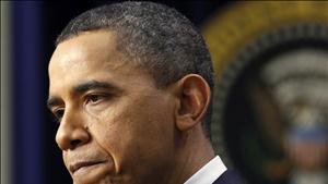 U.S. President Barack Obama pauses as he answers a question from a reporter during a news conference at the White House in Washington