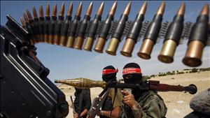Palestinian militants of the Democratic Front for the Liberation of Palestine take part in a joint drill for the media in the Gaza Strip